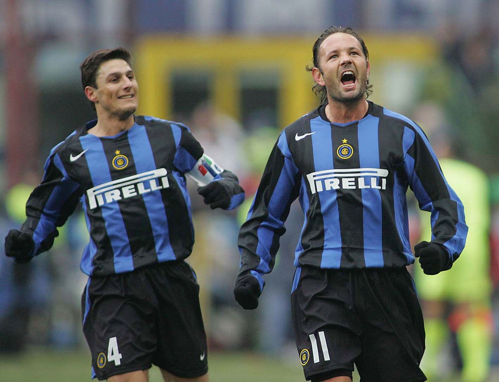 MILAN, ITALY - DECEMBER 19: Inter Milan's Sinisa Mihajlovic (R) celebrates his goal with Cristiano Zanetti, during the Italian Serie A match between Inter Milan and Brescia at the Stadio Giuseppe Meazza on December 19, 2004, in Milan, Italy. (Photo by New Press/Getty Images)