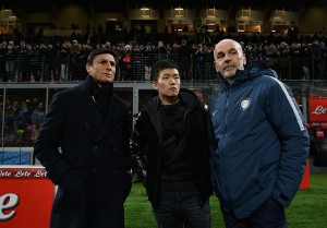 MILAN, ITALY - JANUARY 14: Vice President Javier Zanetti, FC Internazionale board member Steven Zhang and Head coach of FC Internazionale Stefano Pioli look before the Serie A match between FC Internazionale and AC ChievoVerona at Stadio Giuseppe Meazza on January 14, 2017 in Milan, Italy. (Photo by Claudio Villa - Inter/Inter via Getty Images)