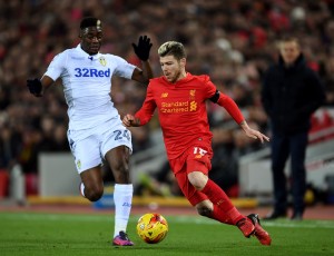 LIVERPOOL, ENGLAND - NOVEMBER 29: Alberto Moreno of Liverpool takes on Hadi Sacko of Leeds United during the EFL Cup Quarter-Final match between Liverpool and Leeds United at Anfield on November 29, 2016 in Liverpool, England. (Photo by Laurence Griffiths/Getty Images)