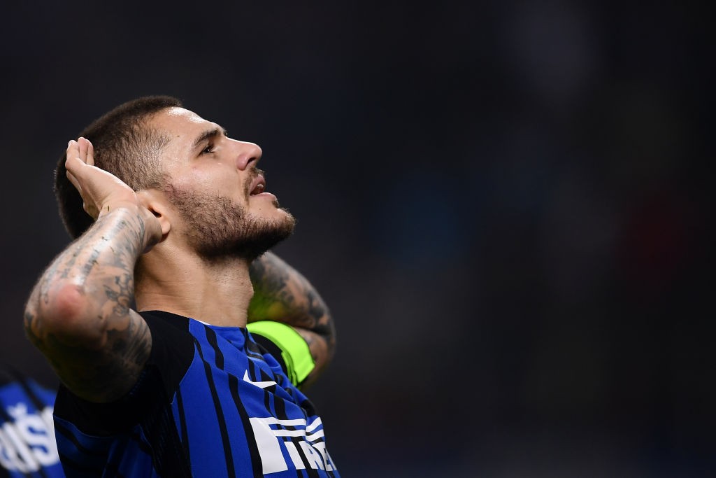 Inter Milan's forward Mauro Icardi from Argentina celebrates after scoring during the Italian Serie A football match Inter Milan Vs AC Milan on October 15, 2017 at the 'San Siro Stadium' in Milan. / AFP PHOTO / MARCO BERTORELLO (Photo credit should read MARCO BERTORELLO/AFP/Getty Images)